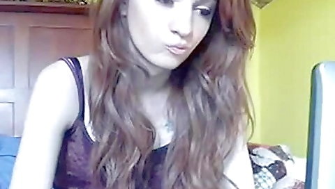 Beautiful girl with a nice face shows off her sexy body