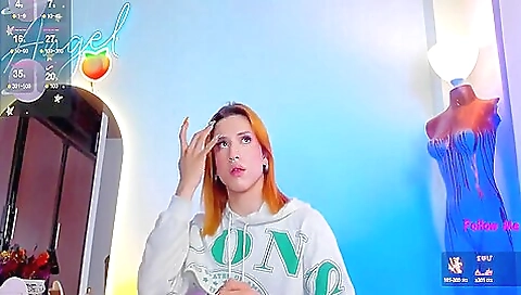 Busty redhead with a sexy body shows off her pussy